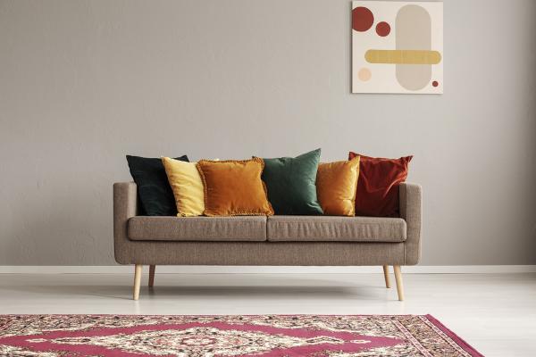 Mixed colour cushions on sofa